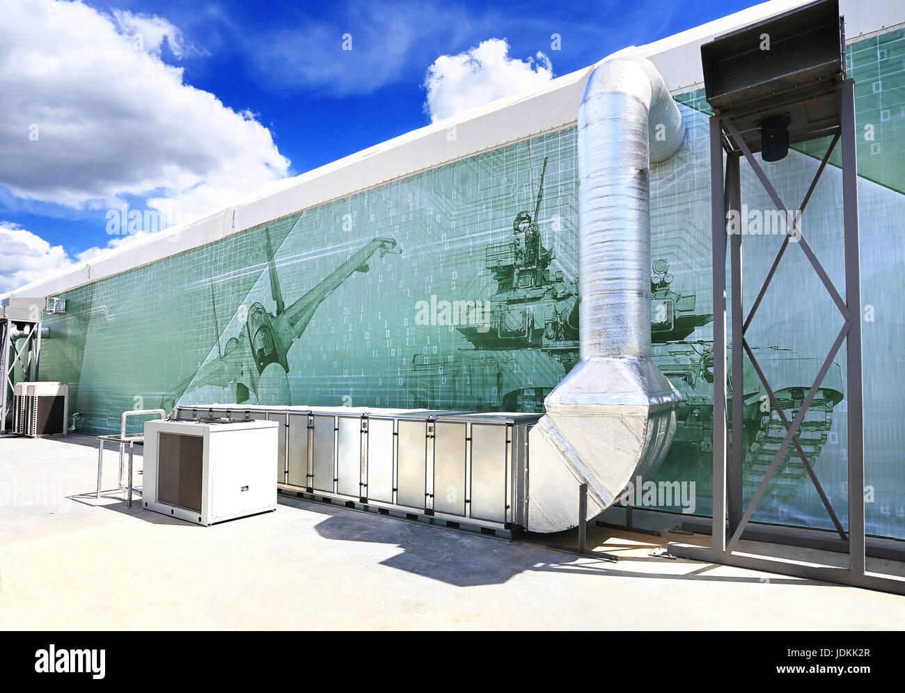 Ventilation pipes and actuators on the wall of an exhibition pavilion Stock Photo