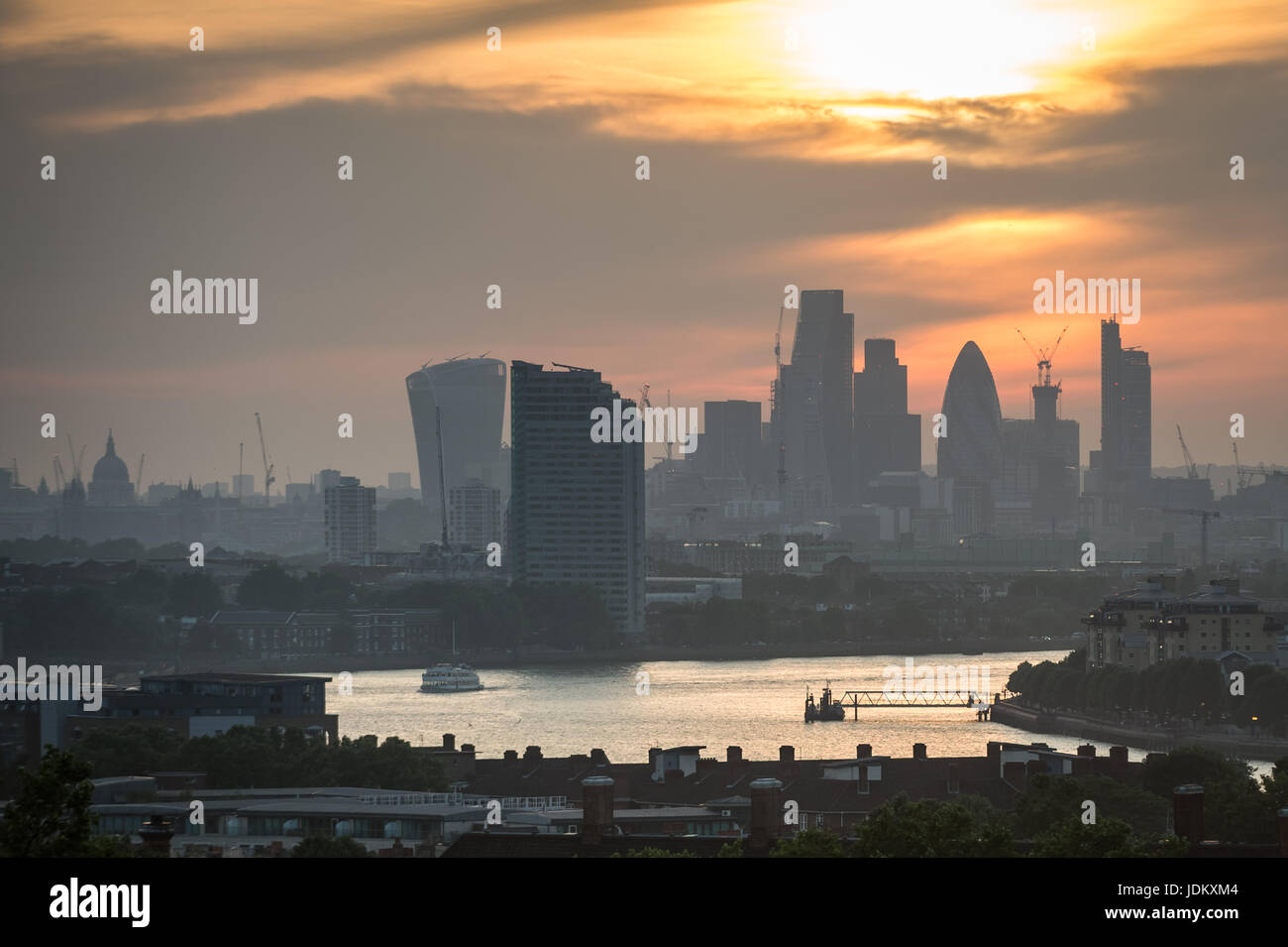 London, UK. 20th June, 2017. UK Weather: Evening sunset over the city seen from Greenwich Park ending one of the hottest days of the year. © Guy Corbishley/Alamy Live News Stock Photo