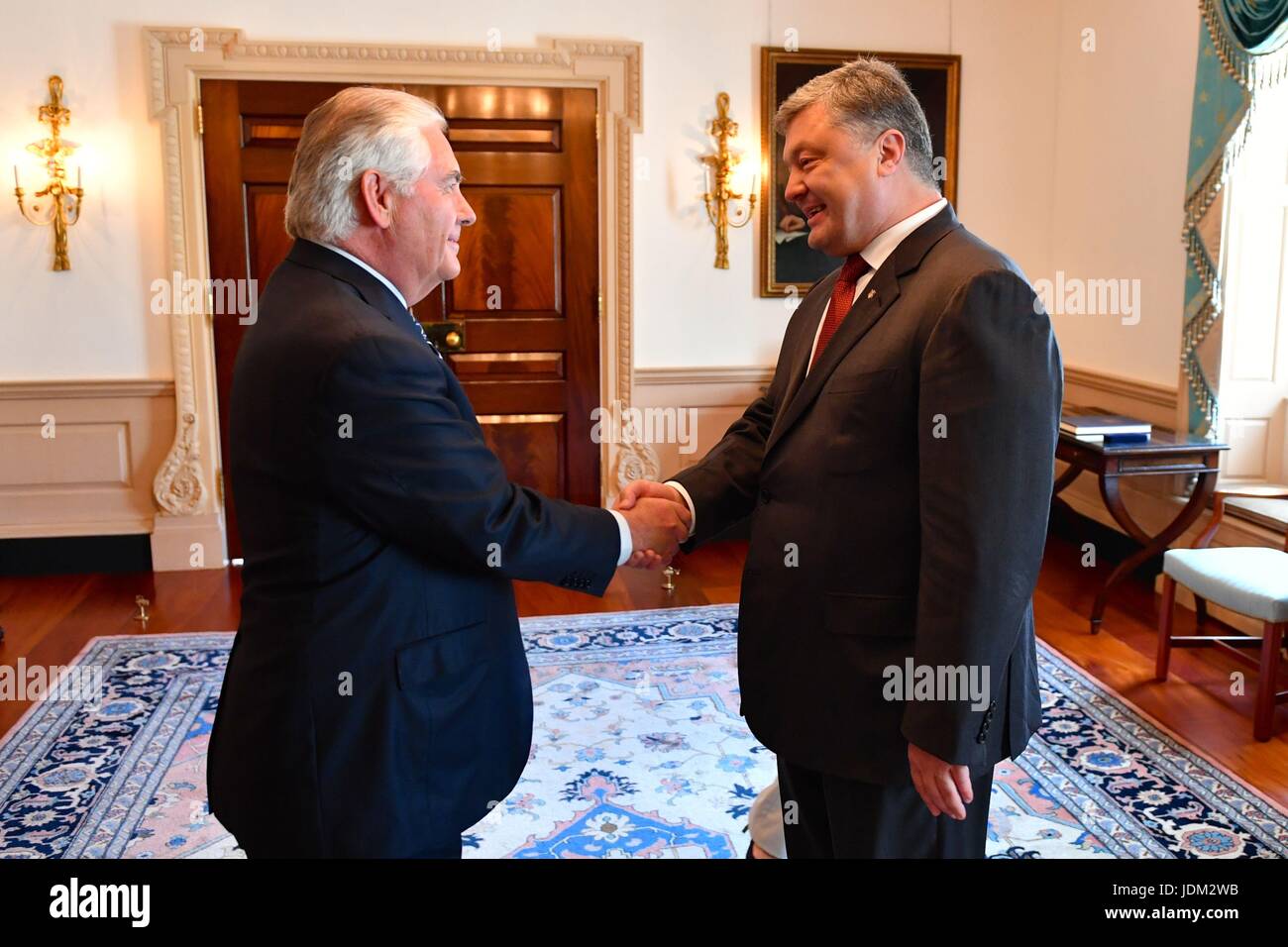 U.S. Secretary of State Rex Tillerson, left, welcomes Ukrainian President Petro Poroshenko prior to their bilateral meeting at the State Department June 20, 2017 in Washington, DC. Stock Photo