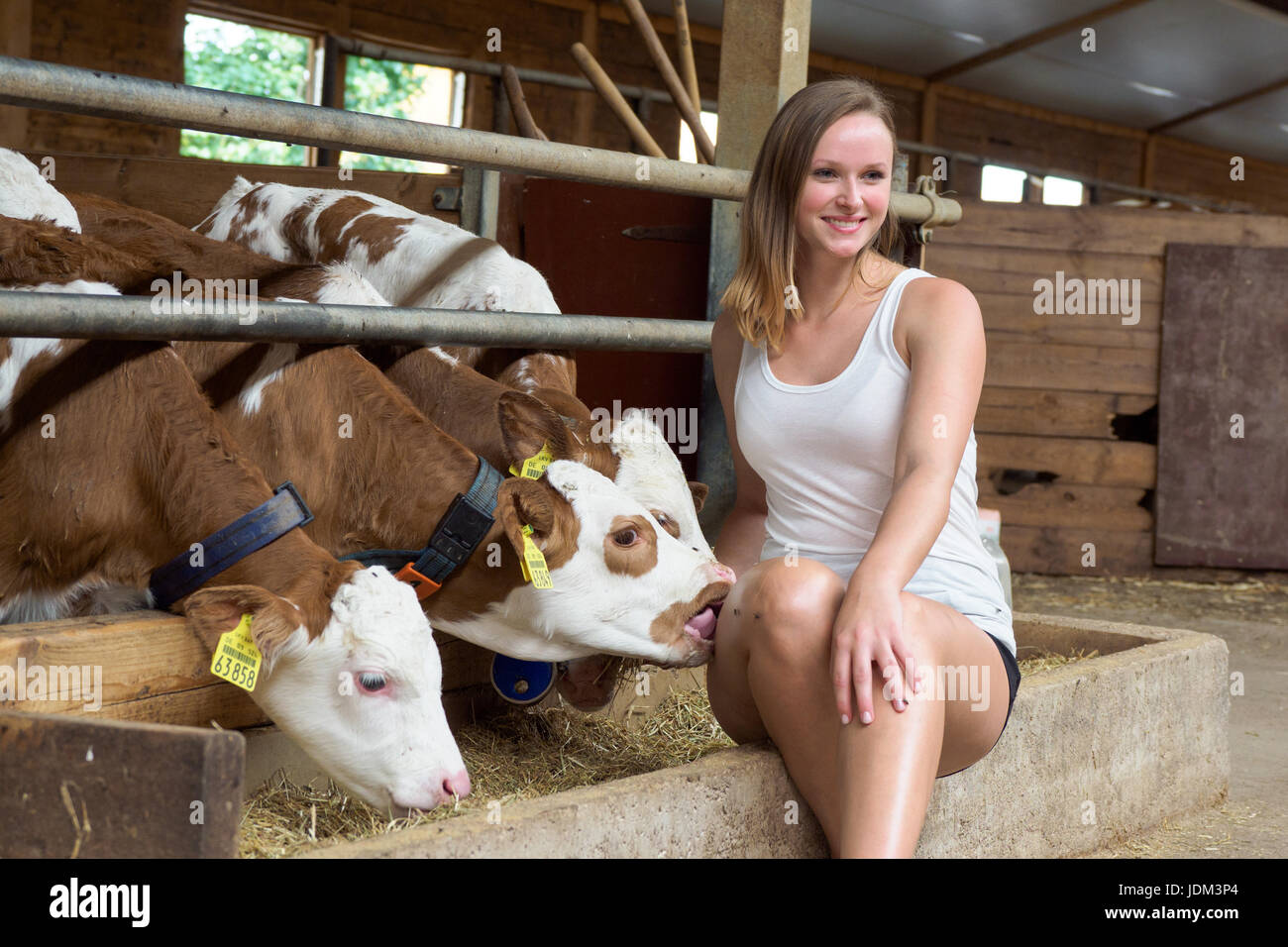 Seybothenreuth, Germany. 21st June, 2017. Felicia poses during the press shoot for the young farmers calender 2018 in Seybothenreuth, Germany, 21 June 2017. Photo: Nicolas Armer/dpa/Alamy Live News Stock Photo