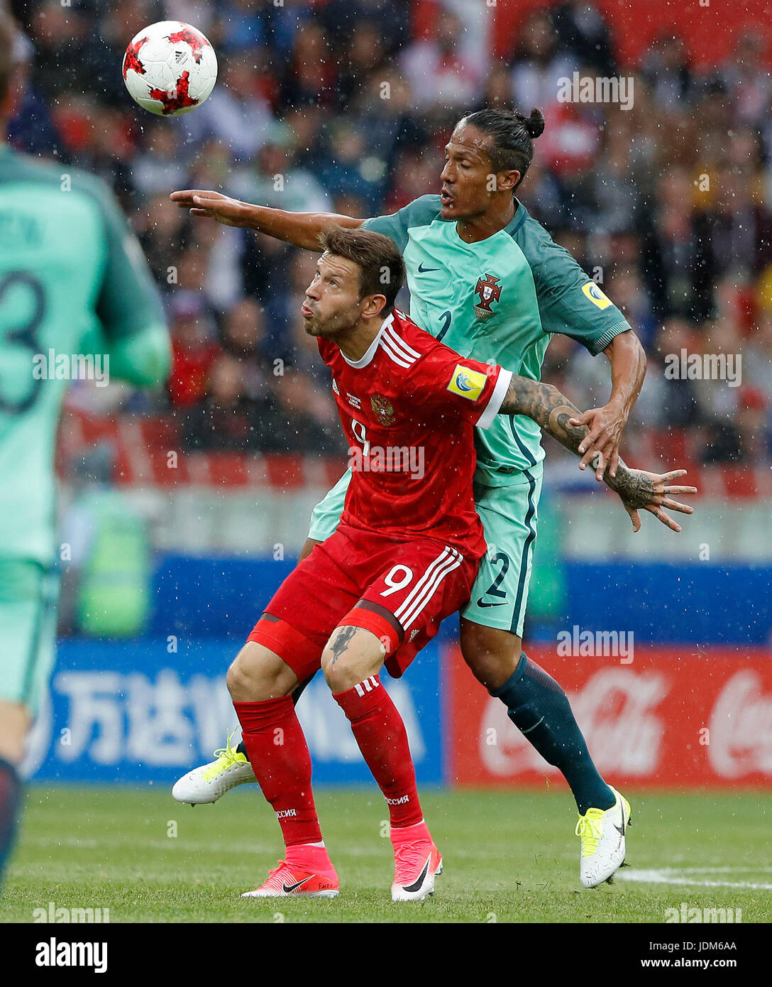 Moscow, Russia. 21st Jun, 2017. BRUNO ALVES of Portugal dispute with Dmitry POLOZ of Russia during match between Russia and Portugal valid for the second round of the Confederations Cup 2017, on Wednesday (21), held at the Spartak Stadium (Otkrytie Arena) in Moscow, Russia . Credit: Foto Arena LTDA/Alamy Live News Stock Photo