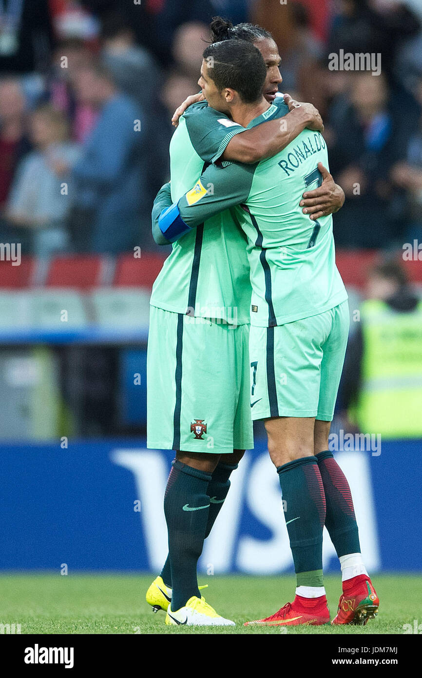 Moscow, Russia. 21st June, 2017. Portugal's Bruno Alves and Cristiano Ronaldo hug after the preliminary stage group A match between Russia and Portugal in the Spartak Stadium in Moscow, Russia, 21 June 2017. Photo: Marius Becker/dpa/Alamy Live News Stock Photo