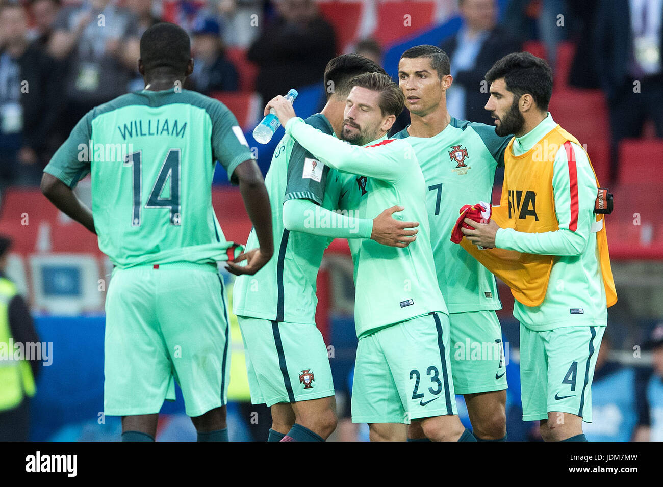Moscow, Russia. 21st June, 2017. Portugal's William (left to right), Adrian Silva, Cristiano Ronaldo and Luis Neto hug after the preliminary stage group A match between Russia and Portugal in the Spartak Stadium in Moscow, Russia, 21 June 2017. Photo: Marius Becker/dpa/Alamy Live News Stock Photo