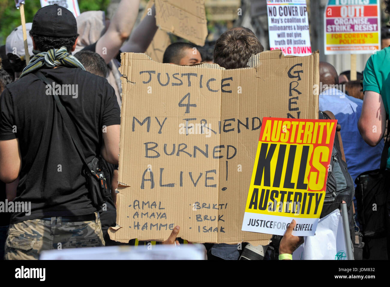 London, UK. 21st June, 2017. Protesters stage a demonstration in Parliament Square after the Queen's Speech on a so called 'Day of Rage'. Many were demanding Justice for the victims of the Grenfell Tower fire whilst others were supporting Jeremy Corbyn and the Labour party. Credit: Stephen Chung/Alamy Live News Stock Photo