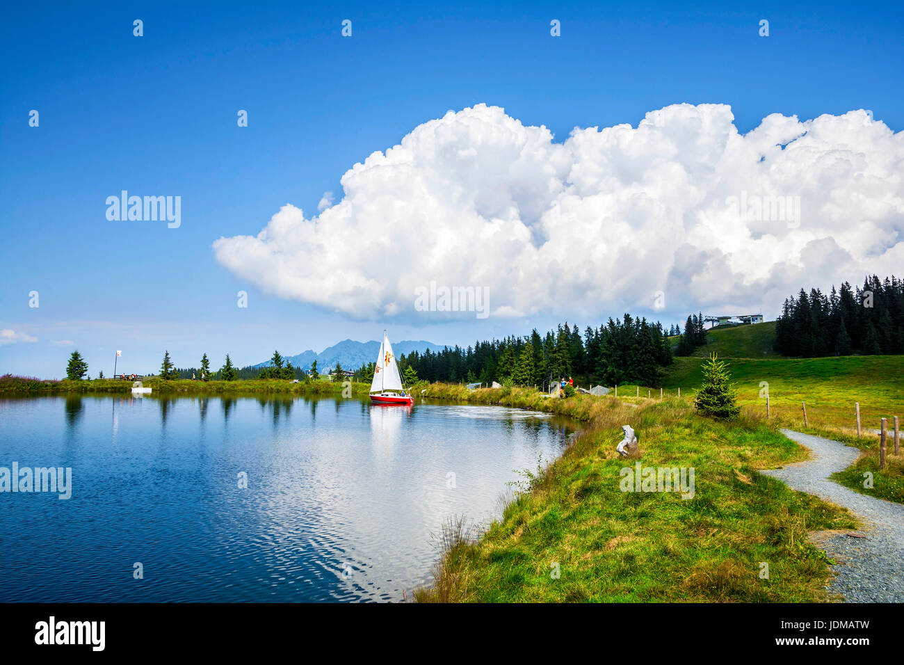 SCHEFFAU, TIROL, AUSTRIA - AUGUST 28, 2016. Hintersteinersee mountain lake, summer wellness attraction in Scheffau am Wilden Kaiser, Tirol, Austria Stock Photo