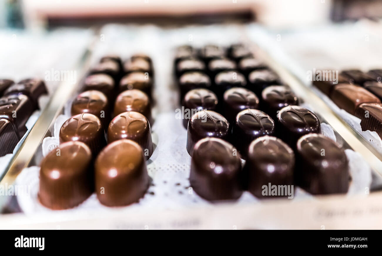 Shiny smooth gourmet chocolate truffles on a tray in bakery Stock Photo Alamy