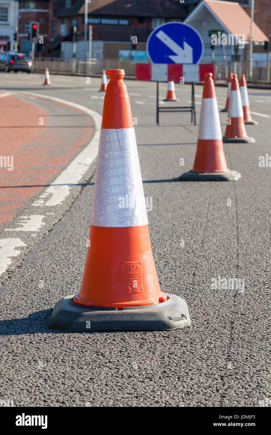 Traffic cones on a road with a temporary lane closure, England, UK Stock Photo
