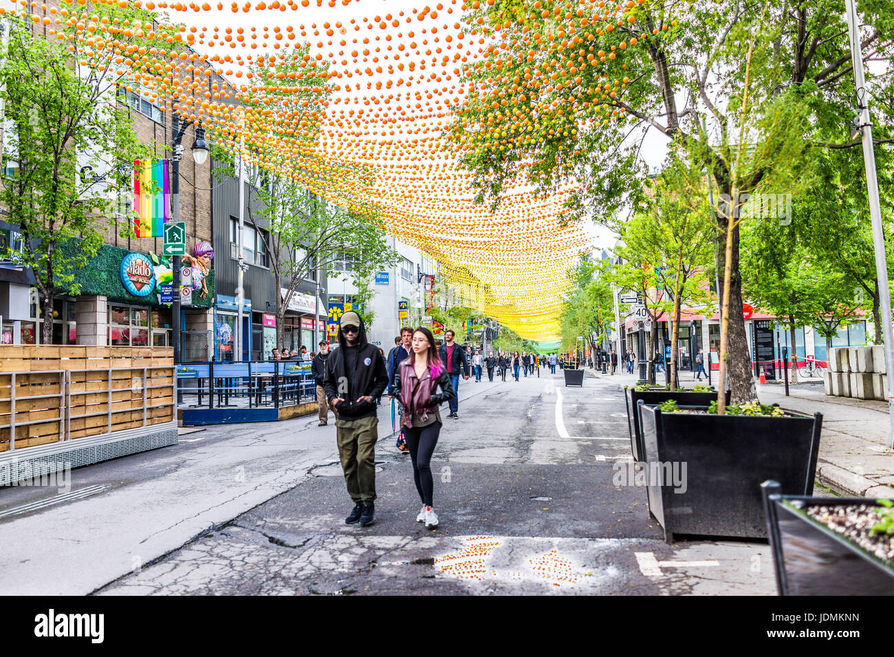 Montreal, Canada - May 26, 2017: People walking on Sainte Catherine ...