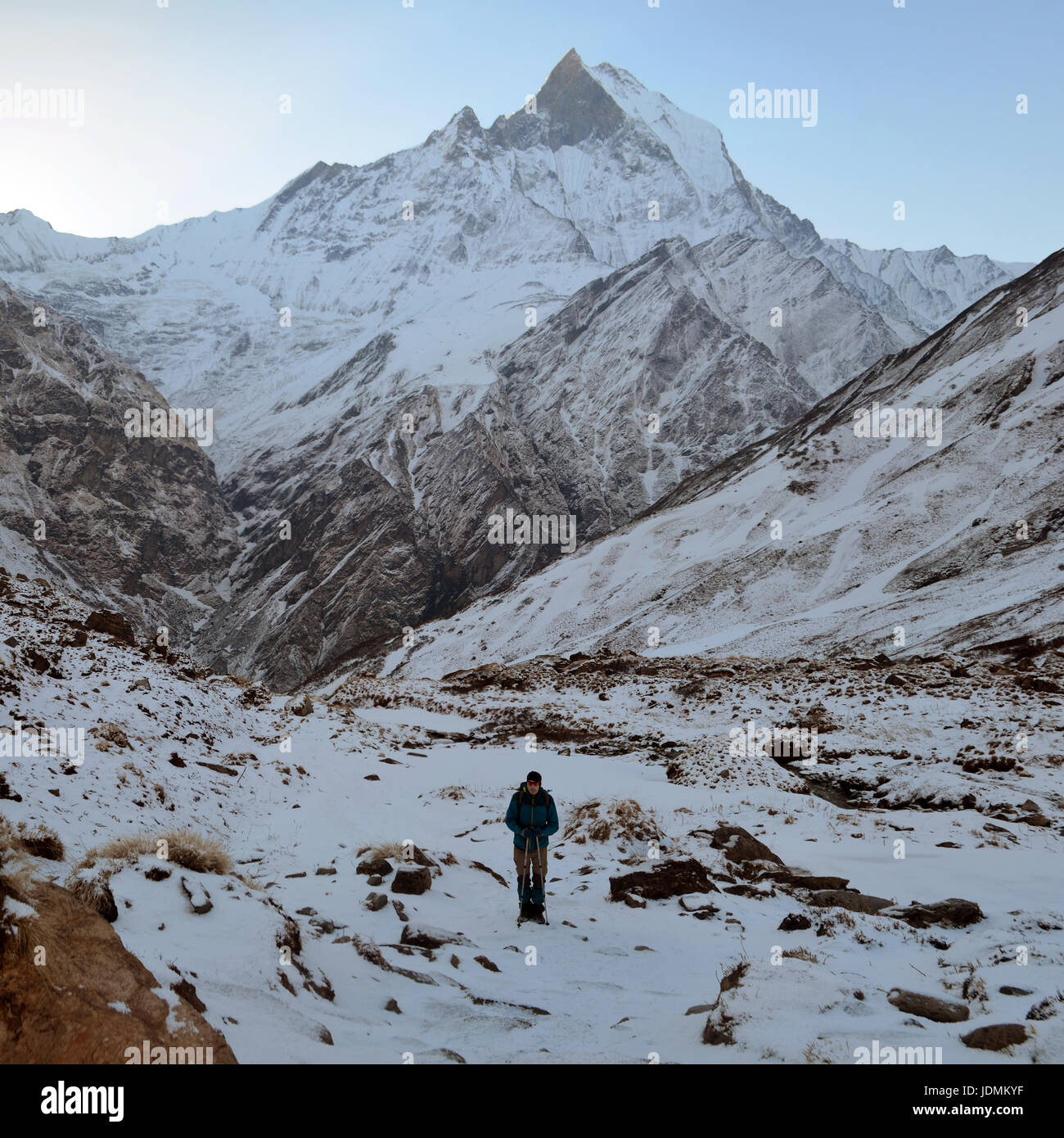 Single traveler in Himalayan mountains. NAnnapurna Base Camp track. Morning Mountain Landscape. Stock Photo