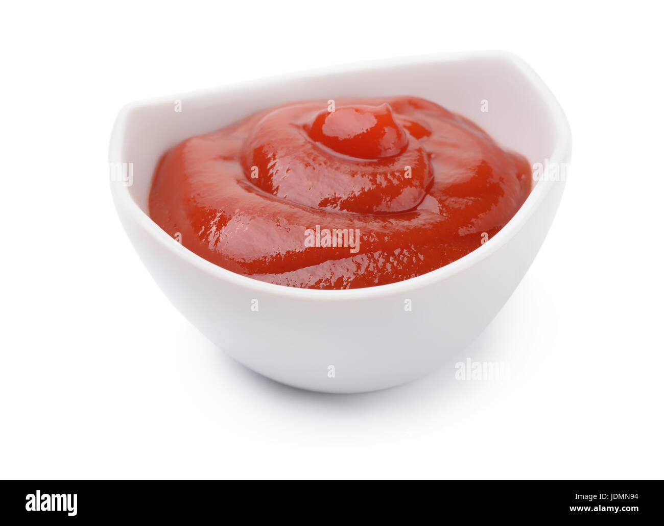Dip bowl of ketchup isolated on white Stock Photo