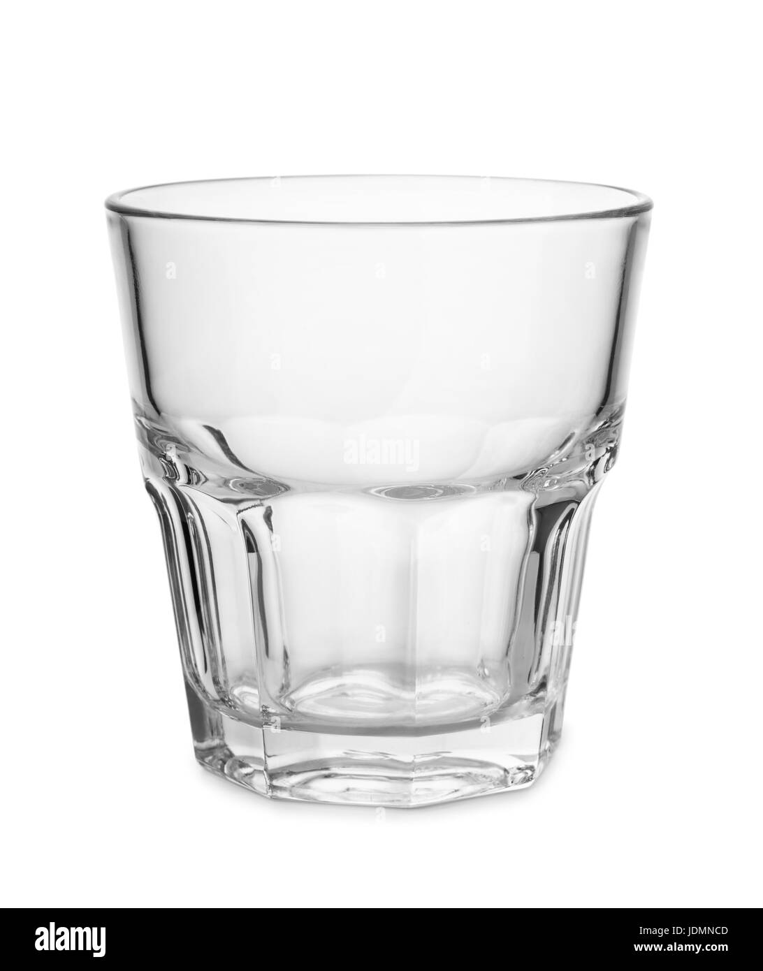 Empty old fashion whiskey glass isolated on white Stock Photo