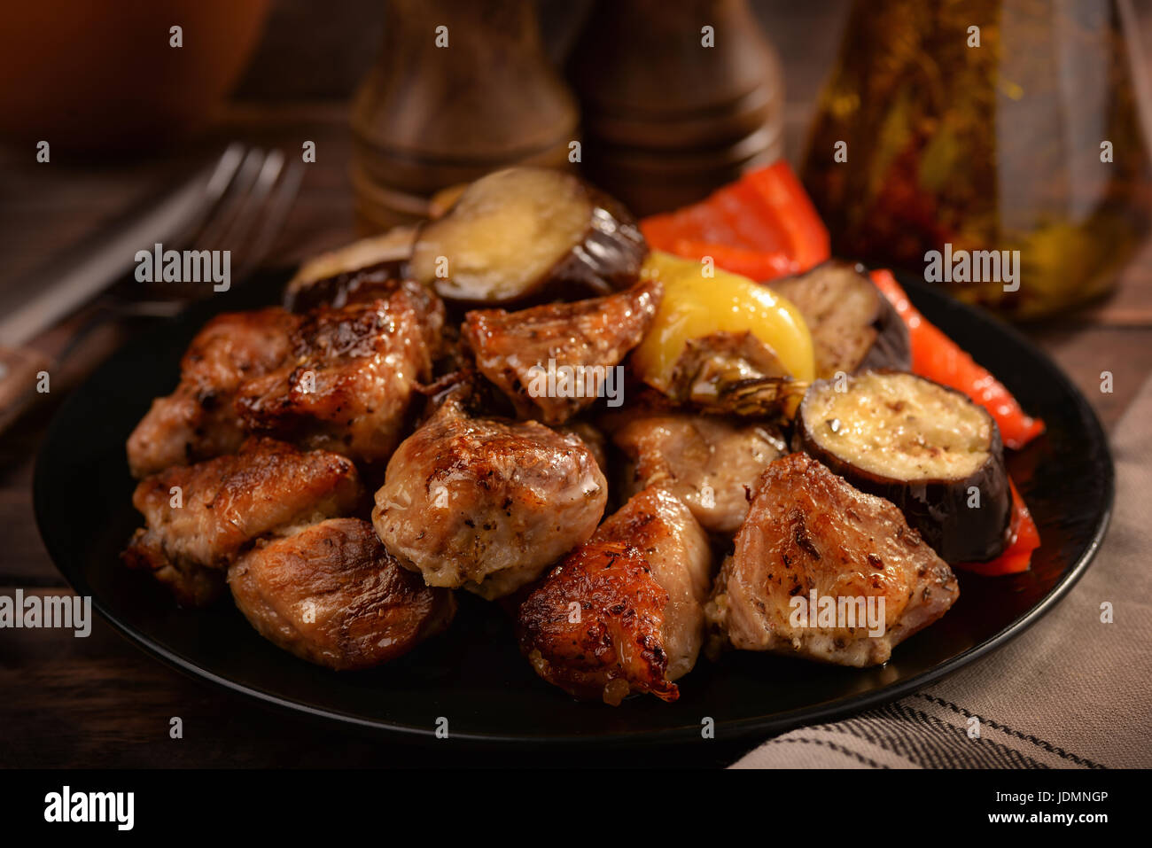 Still life with grilled meat and veggies Stock Photo