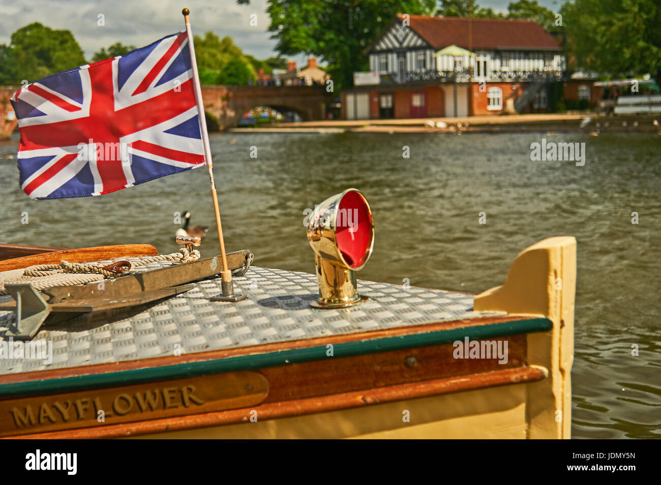 Tourist pleasure cruiser Mayflower flying the Union Jack flag  from the bows, on a summer Saturday in Stratford upon Avon Stock Photo