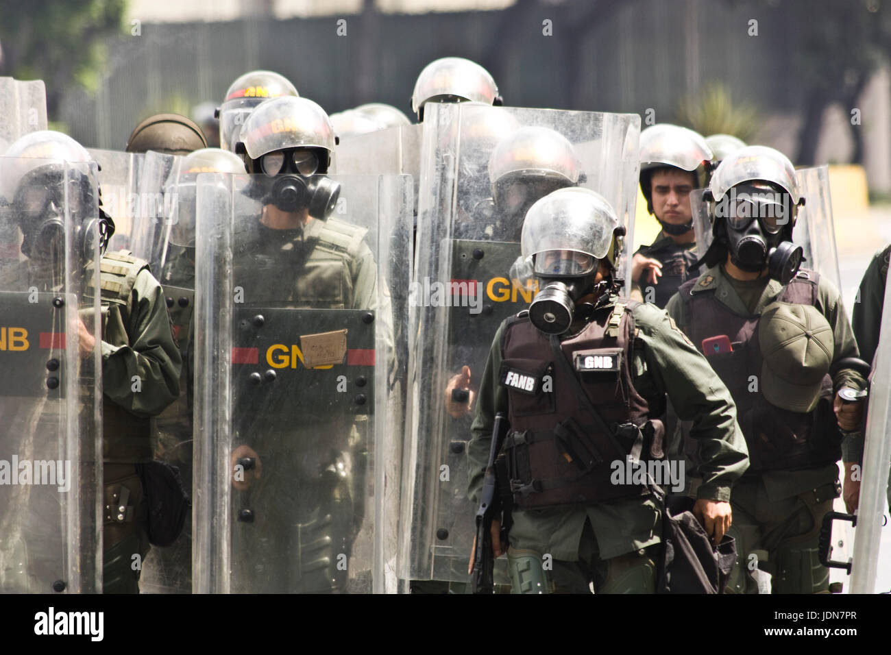 Soldiers from the Bolivarian National Guard getting ready to disperse a protest in Caracas. Stock Photo