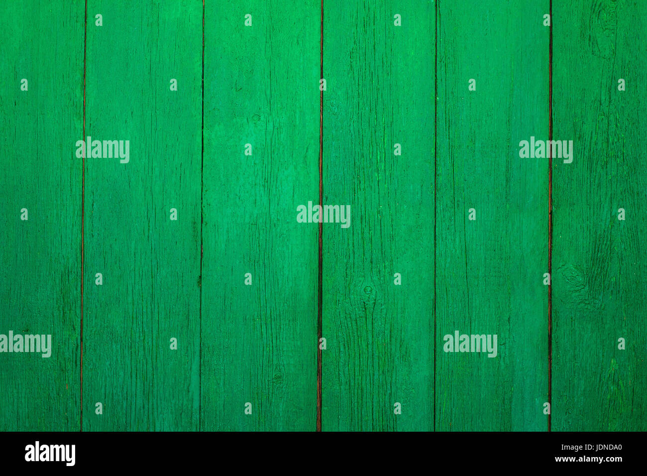 Vintage wooden texture of an old fence painted green. Vertical texture ...