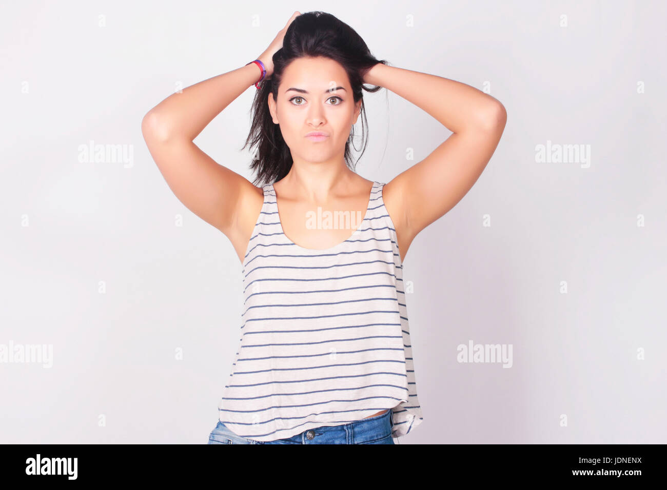 Portrait of beautiful carefree young woman, isolated over white background. Caucasian woman smiling. Stock Photo