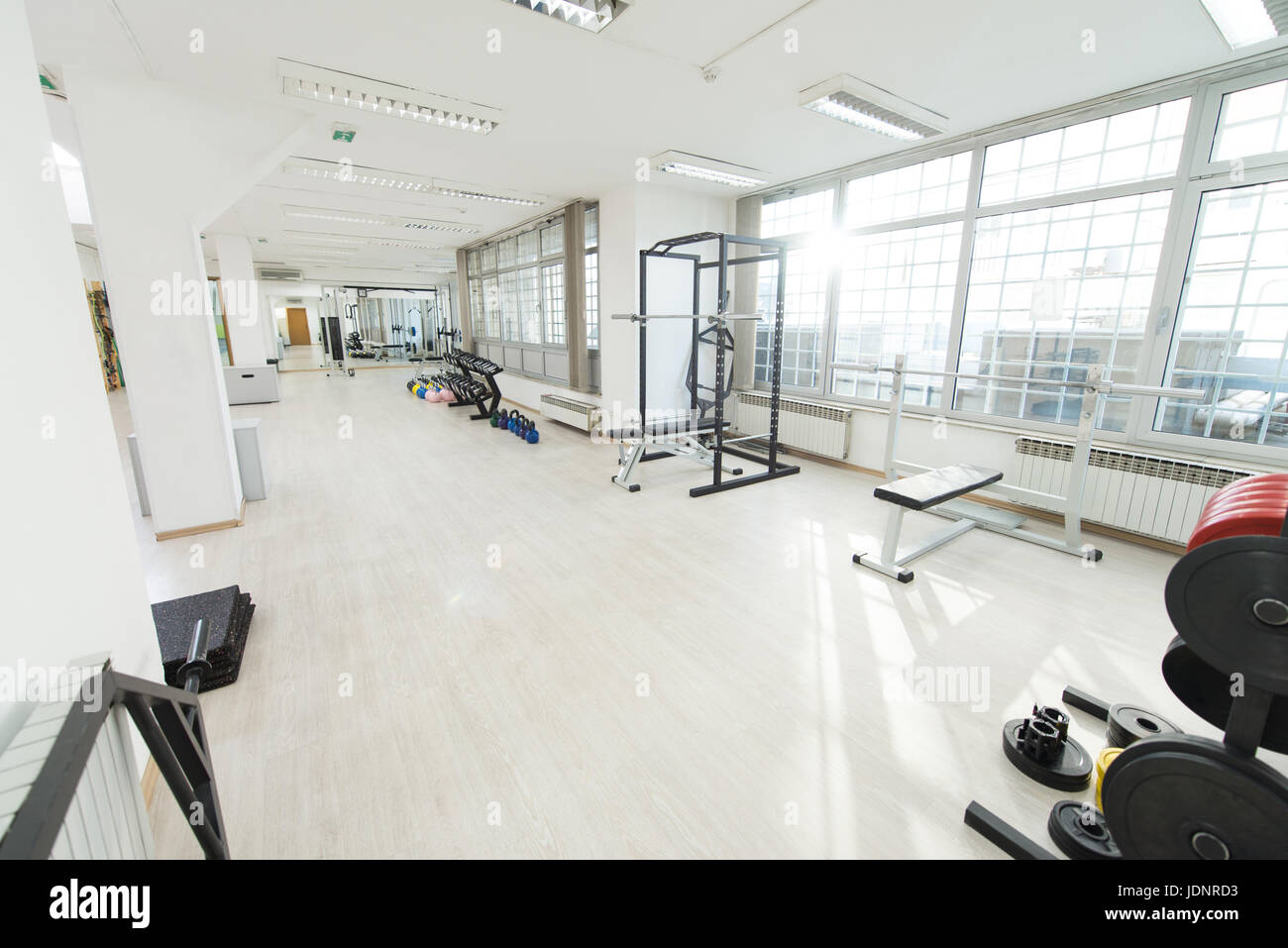 Modern Gym Room Fitness Center With Equipment And Machines Stock Photo ...