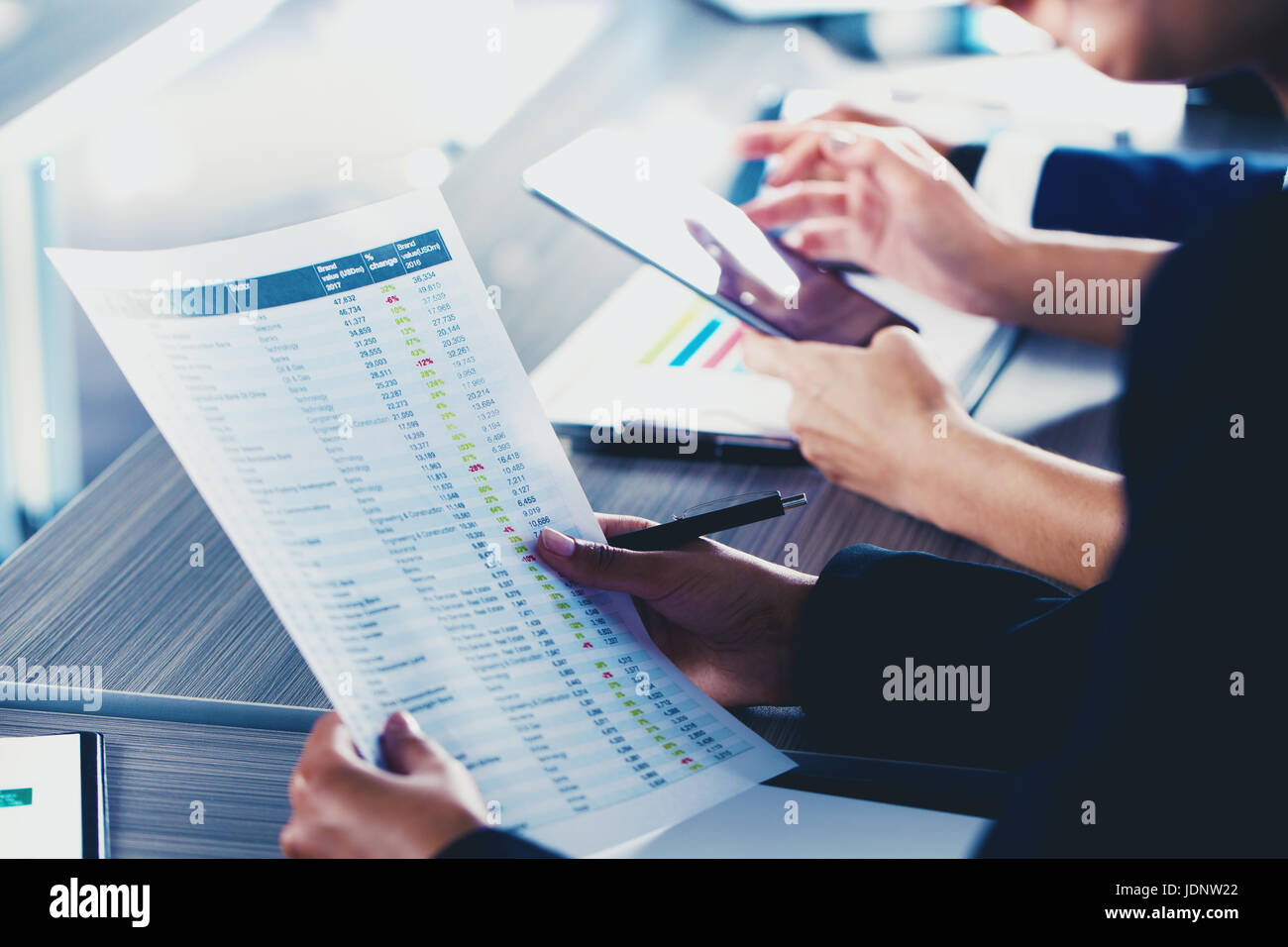 Businesswoman works with statistics number Stock Photo