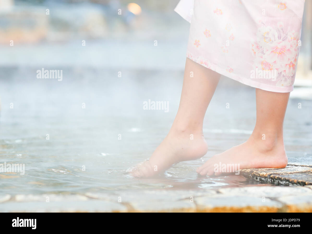 Japanese woman bathing at traditional hot spring, Tokyo, Japan Stock Photo