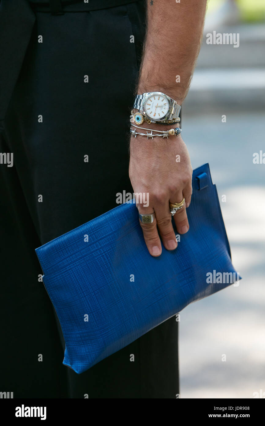 MILAN - JUNE 19: Man with white Rolex Milgauss watch and blue bag before  Giorgio Armani fashion show, Milan Fashion Week street style on June 19,  2017 Stock Photo - Alamy
