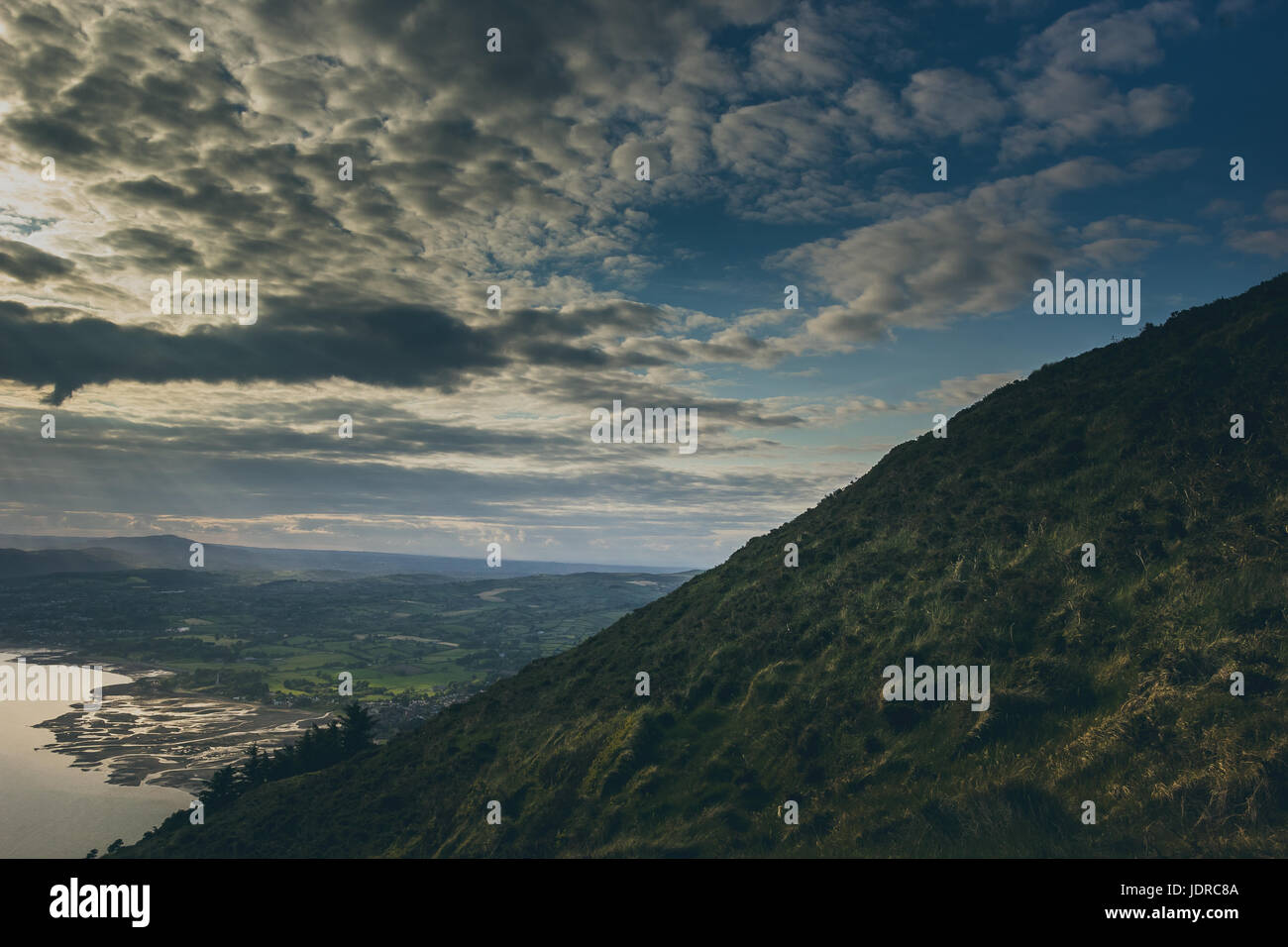 a view off the cliff with a sea and sky Stock Photo - Alamy