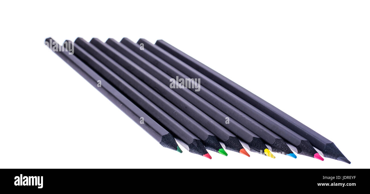 Set of beautiful black colored pencils on White background. Studio