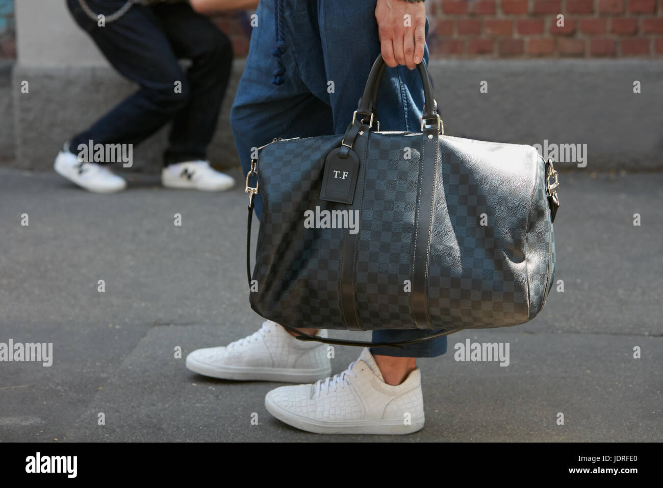 Woman with Gray and White Checkered Louis Vuitton Bag before Alberta  Ferretti Fashion Show, Milan Fashion Week Editorial Stock Image - Image of  louis, style: 194553719