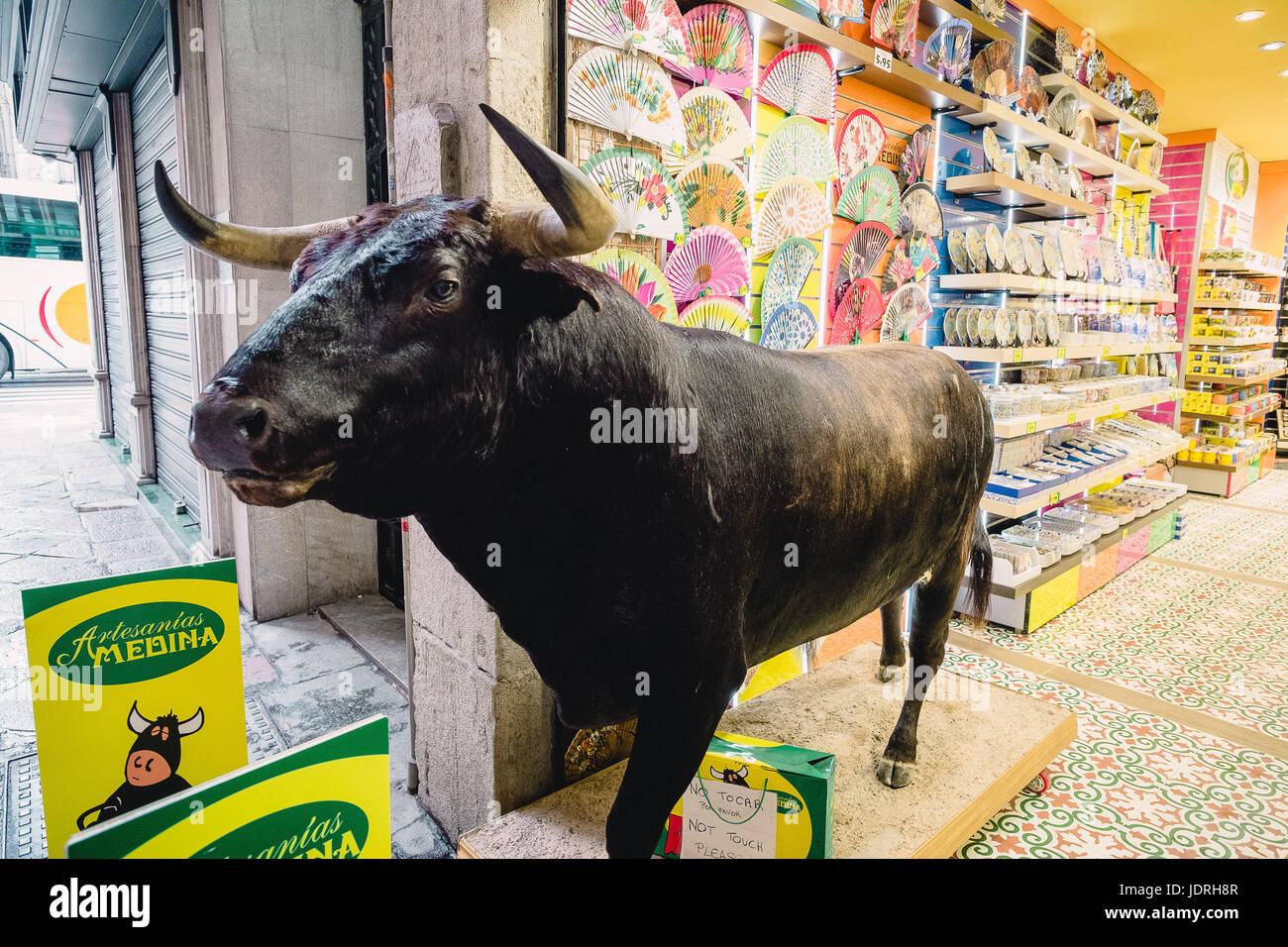 Bull in a china shop. Tourist shop in Granada, Spain, Andalucia, Europe Stock Photo