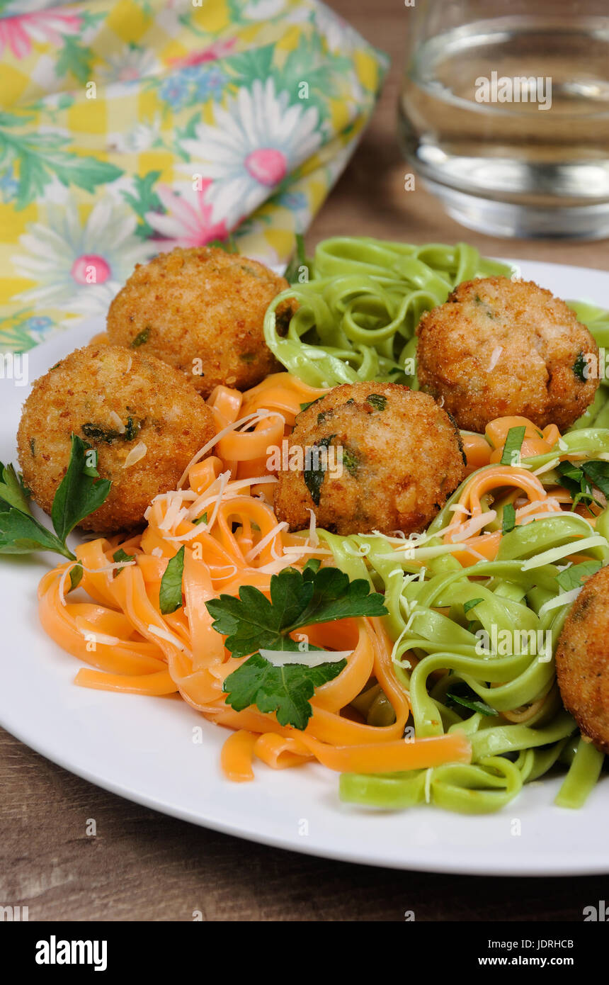 Spaghetti from carrots and spinach with chicken meatballs flavored cheese parmesan, herb Stock