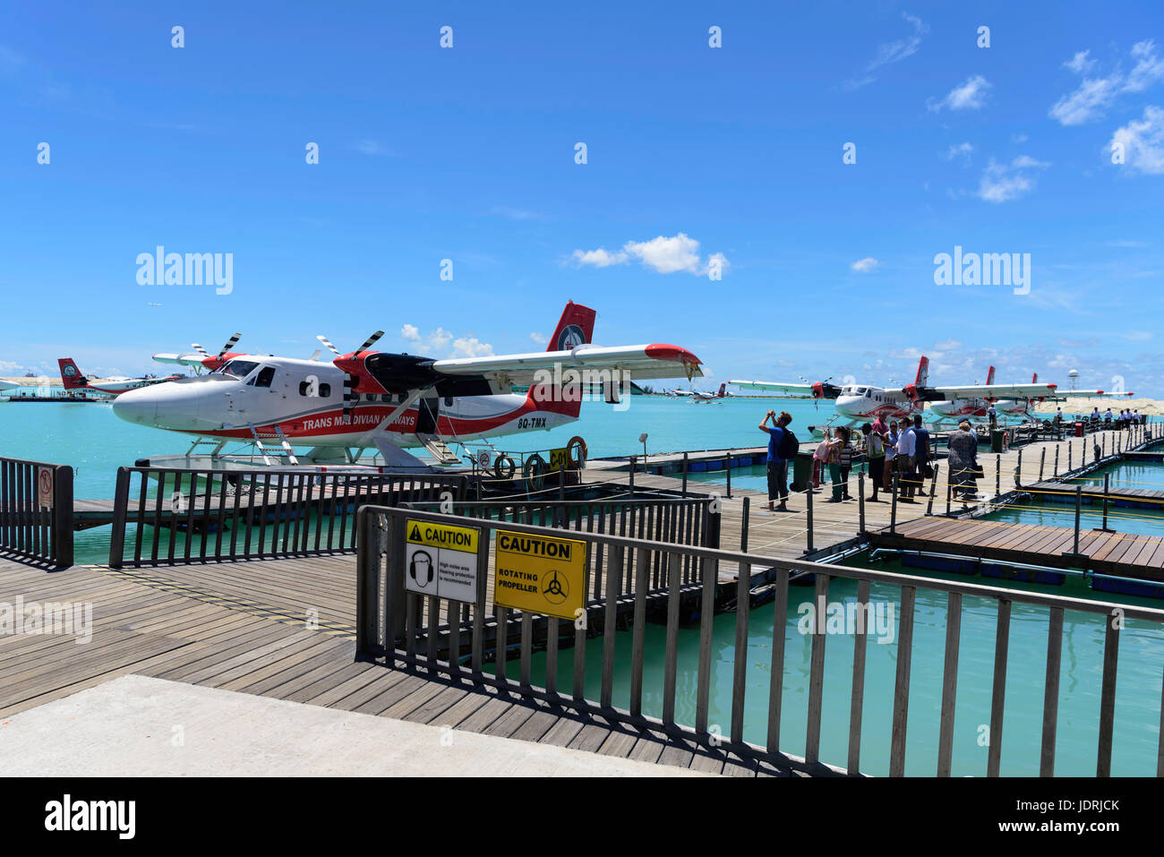 Trans Maldivian Airways Twin Otter seaplanes docked at Velana seaplane port  in Malé Maldives Stock Photo - Alamy