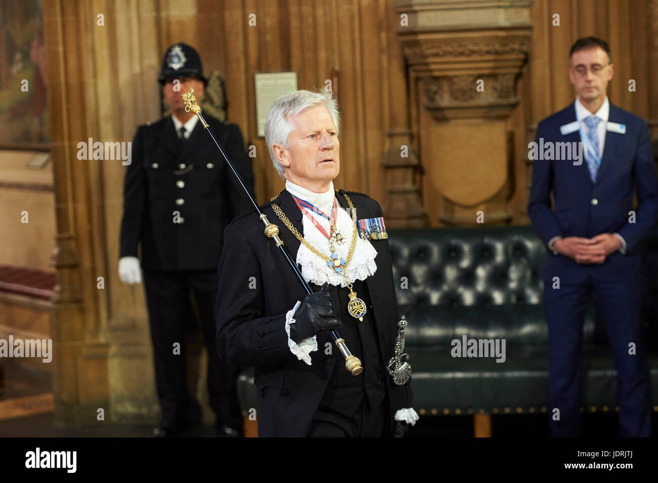 Gentleman Usher of the Black Rod, David Leakey walks across the Central