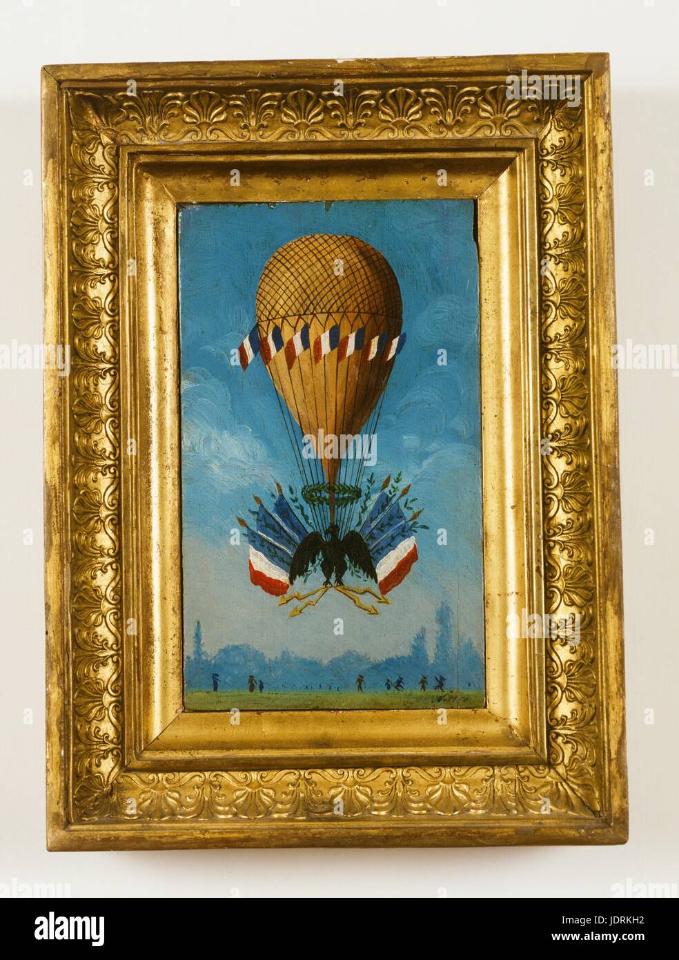 Coronation balloon - Paris 2nd December 1804 (25 Frimaire year XIII according to Republican calendar)   Oil painting on framed panel (34 x 25 cm)  Muller-Quênot Collection For his coronation Napoleon I asked Garnerin to organise an aerostatic experiment for the celebrations in Paris.   The evening ended with a firework display at eleven o'clock in the evening followed by the ascent of a large balloon decorated with flags and surrounded by four other aerostats. An eagle and an imperial crown were illuminated by three thousand coloured lights placed around the gondola. The painting consists of a Stock Photo