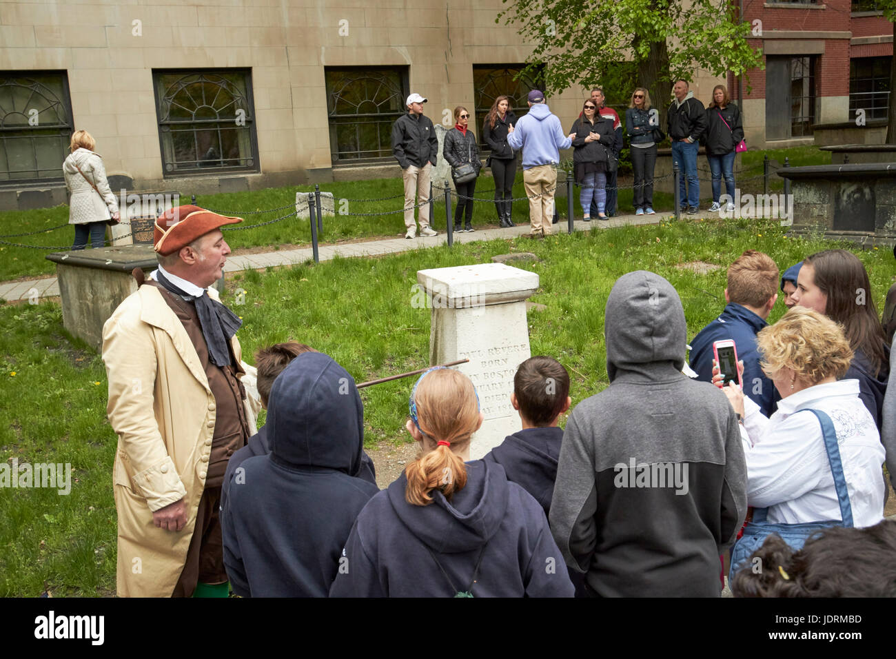 tour groups at paul reveres grave in Granary Burying ground Boston USA Stock Photo