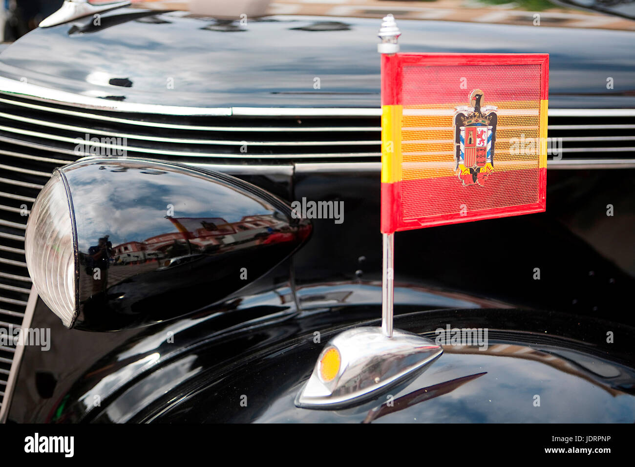 Francoist flag on vintage car, Spain Stock Photo