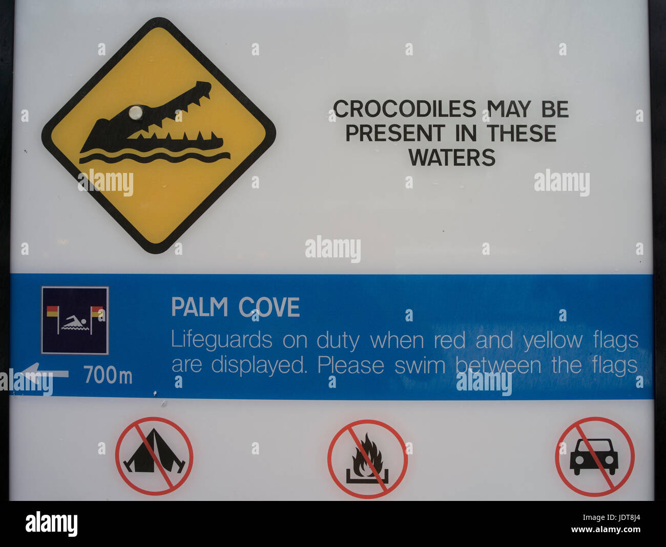 Crocodile warning sign at Palm Cove, near Cairns, Queensland, Australia Stock Photo