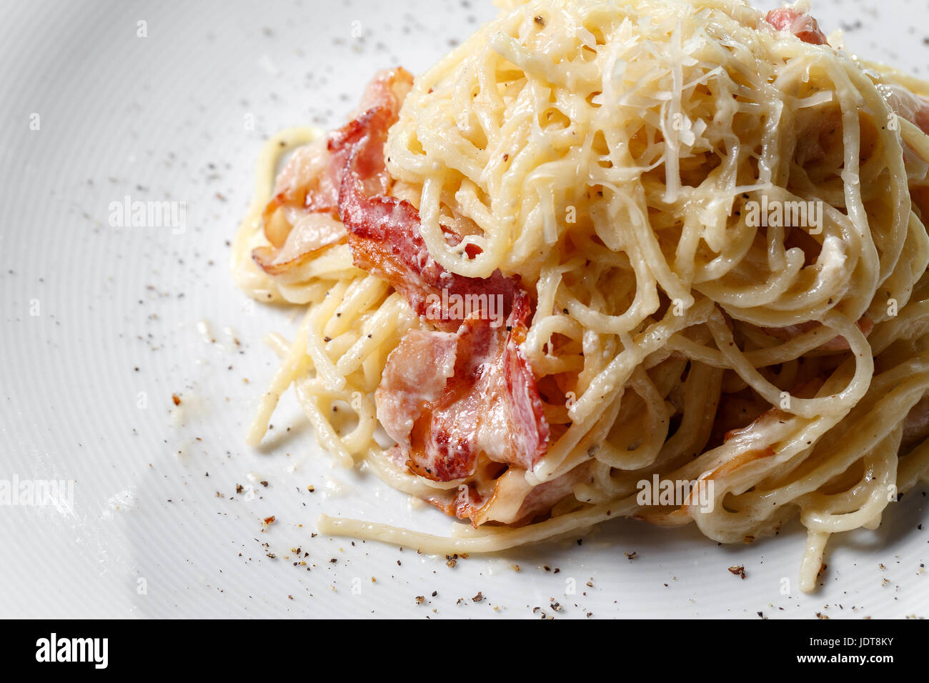 Spaghetti carbonara on a white background Stock Photo