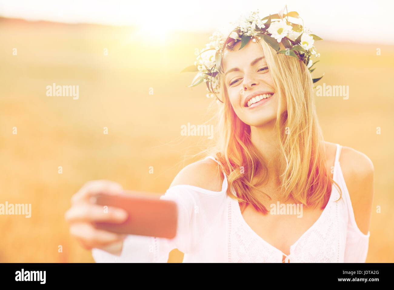 happy young woman taking selfie by smartphone Stock Photo - Alamy
