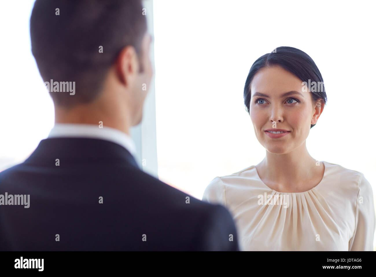 smiling business man and woman at office Stock Photo - Alamy