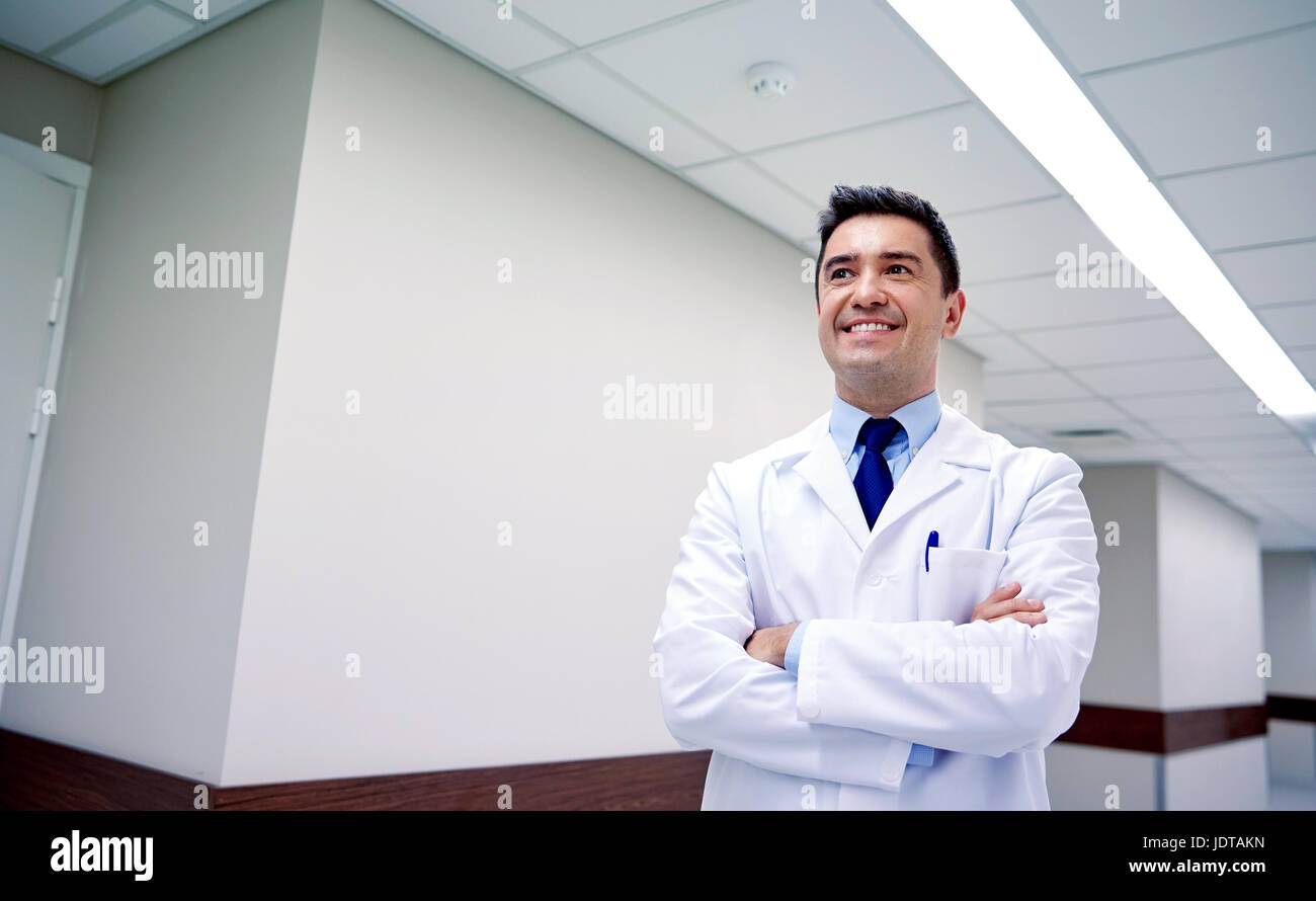 smiling doctor at hospital corridor Stock Photo - Alamy