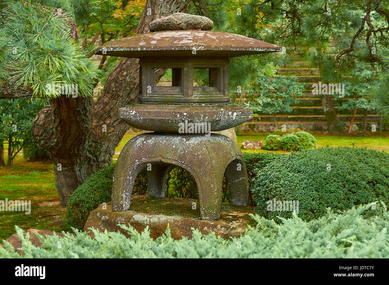 Kyoto, Japan - October21,2016 : A traditional lantern made of stone. An element in Japanese garden. it is considered as an offering to Buddha. Stock Photo