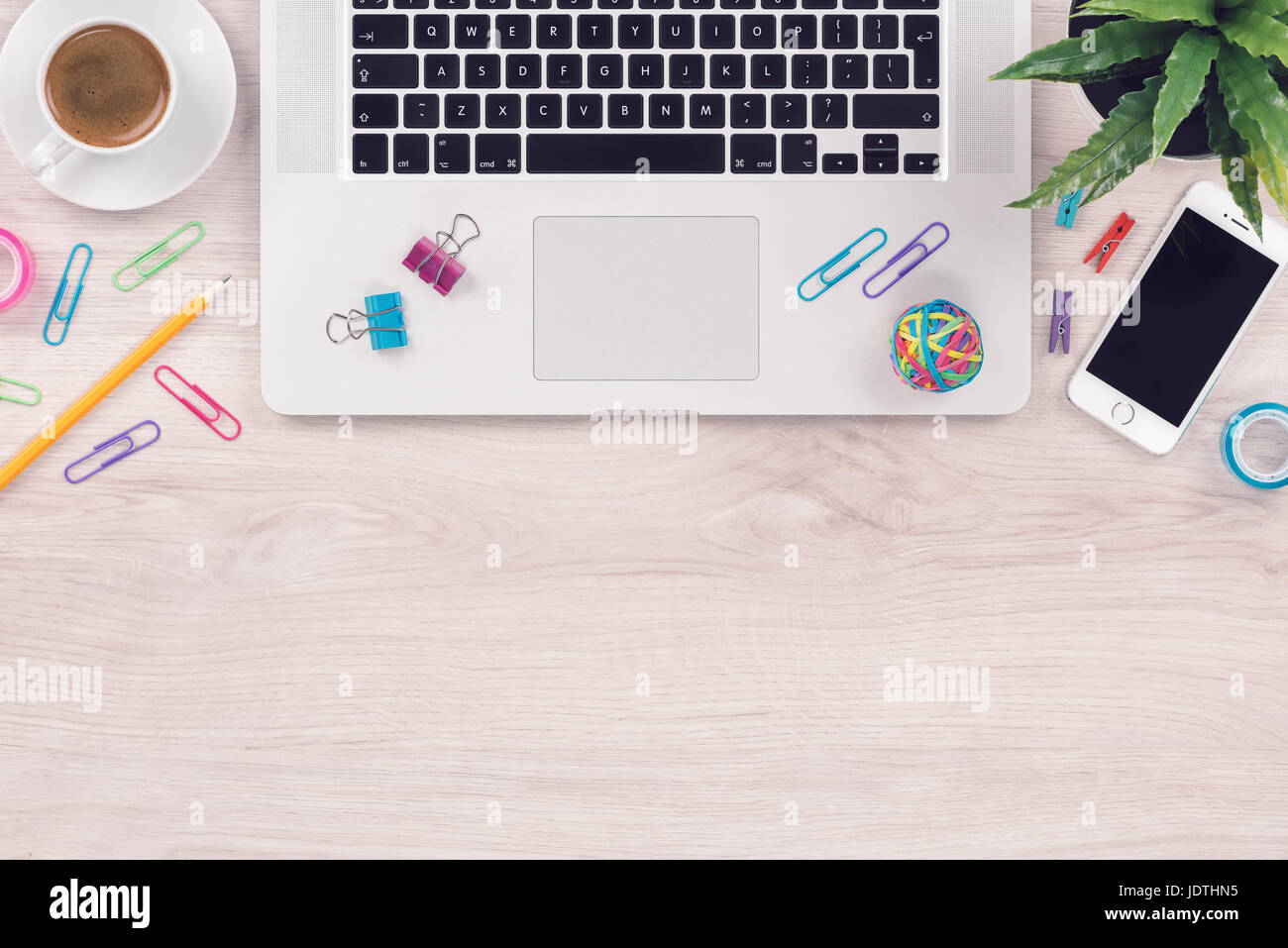 Office desk table workplace with laptop keyboard and smartphone top view flat lay with copy space Stock Photo