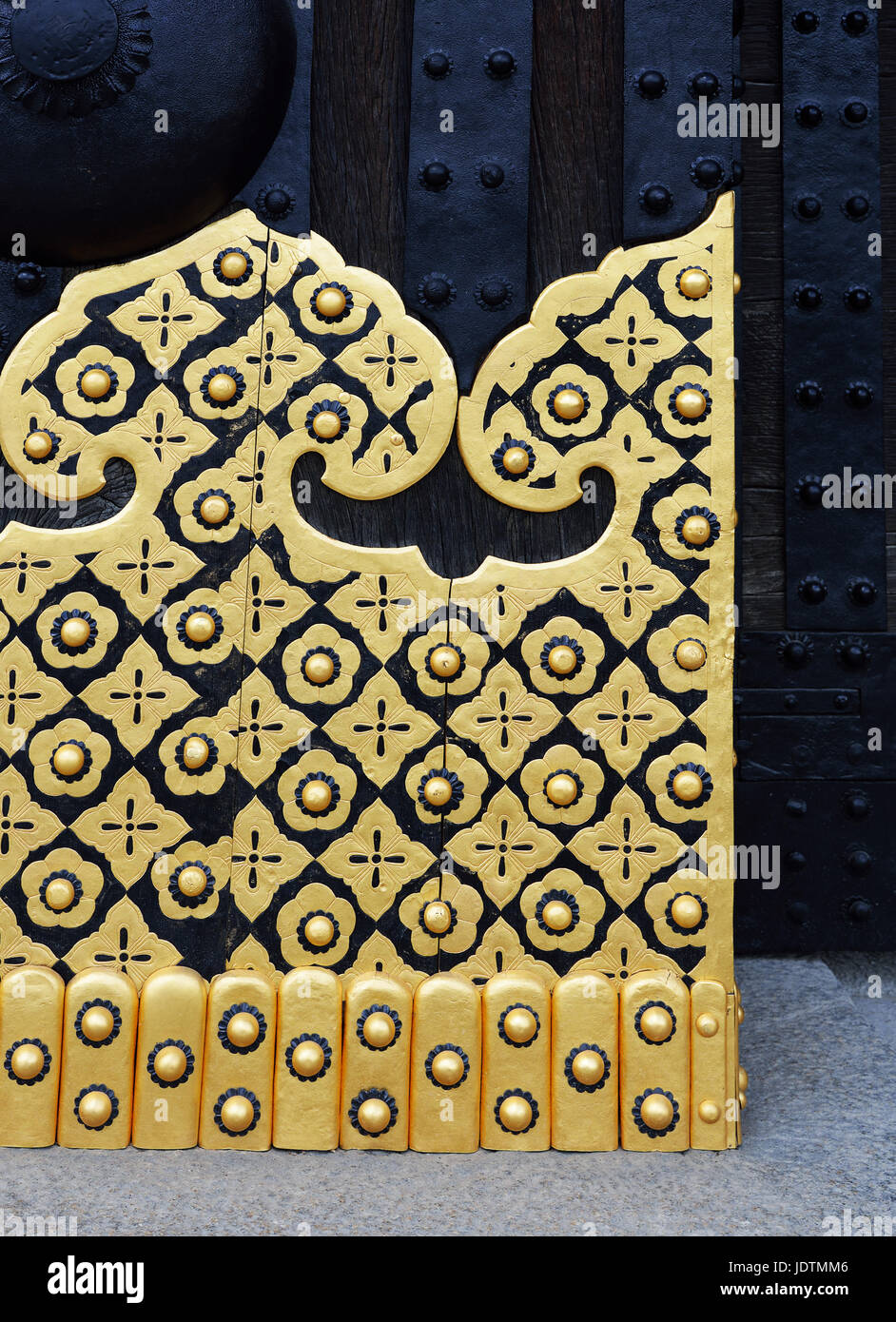 Closeup of the East Gate (Higashi Ote-mon) of Nijo Castle, Kyoto, Japan, showing the gold decorations on its door. Stock Photo