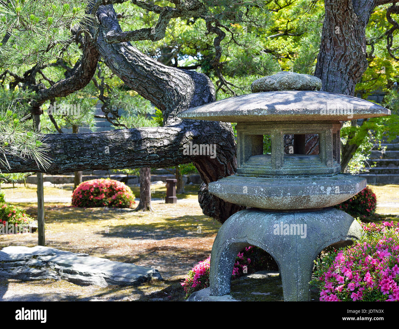 A stone lantern in the Honmaru Garden, Nijo Castle, Kyoto, Japan Stock Photo