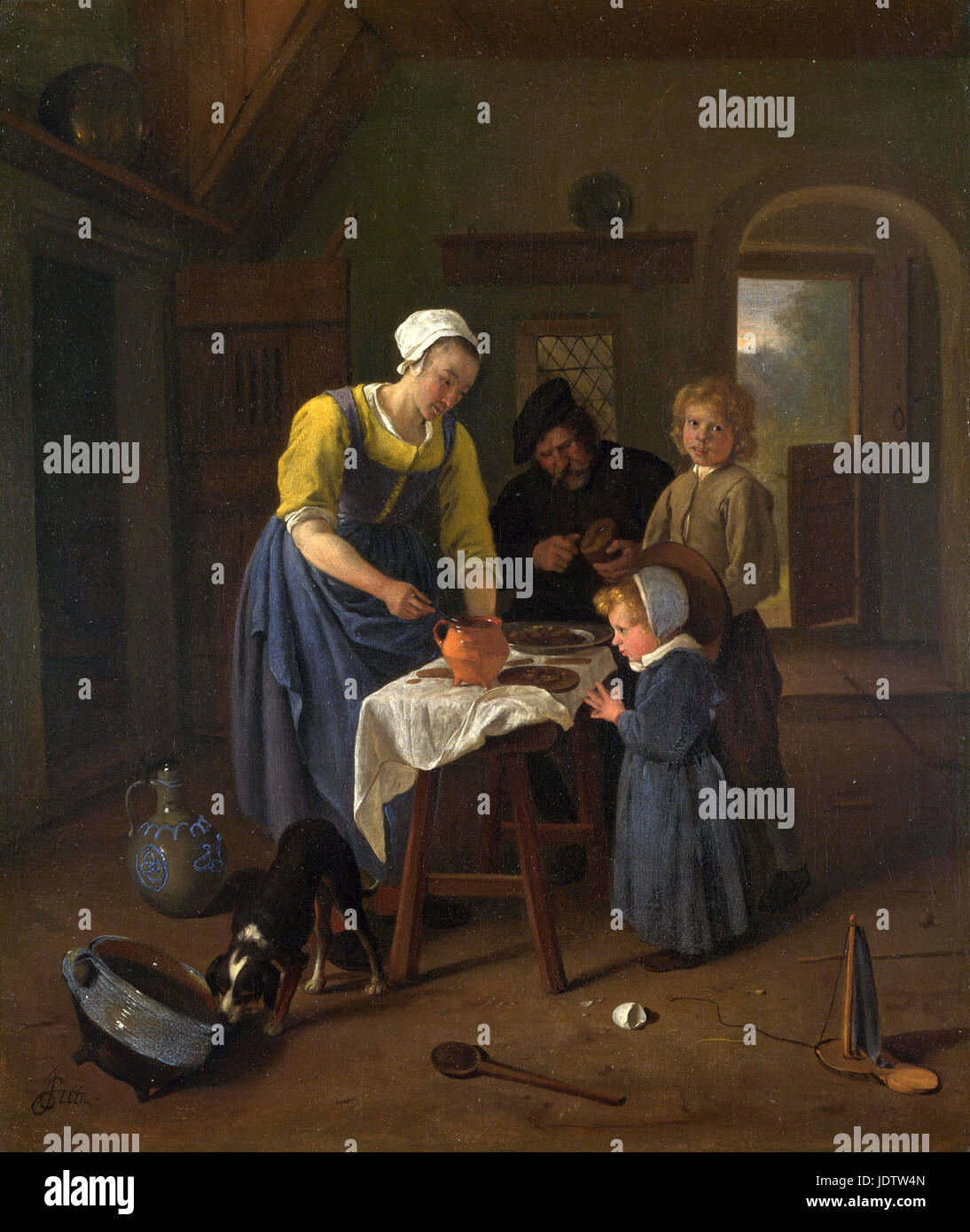 Jan Steen -  A Peasant Family at Meal-time ('Grace before Meat')   1665 Stock Photo