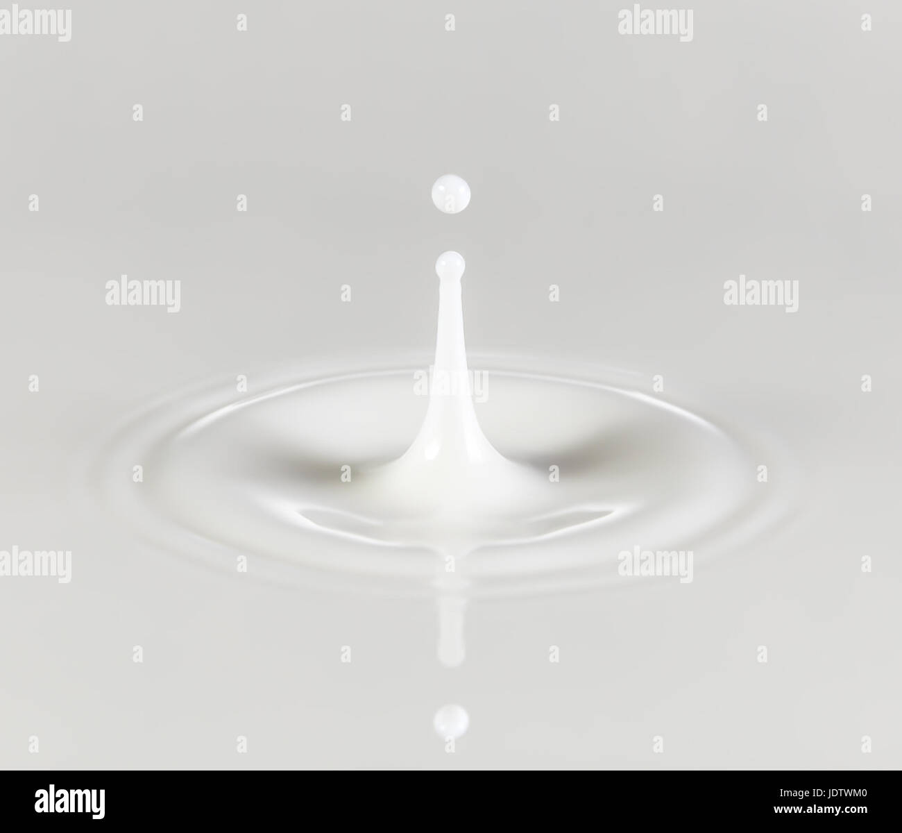 splashing milk drop Stock Photo Alamy