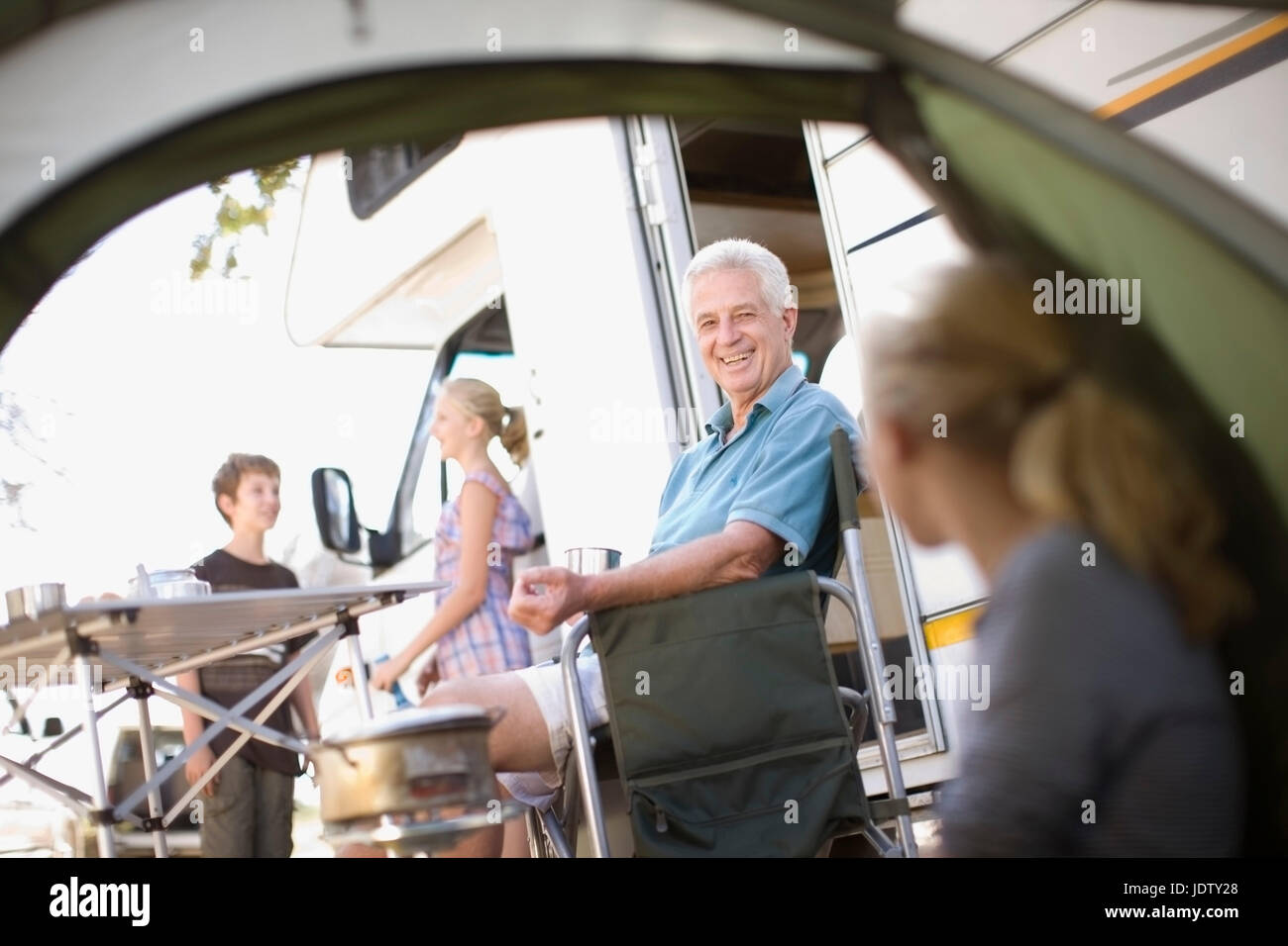Family camping with RV Stock Photo
