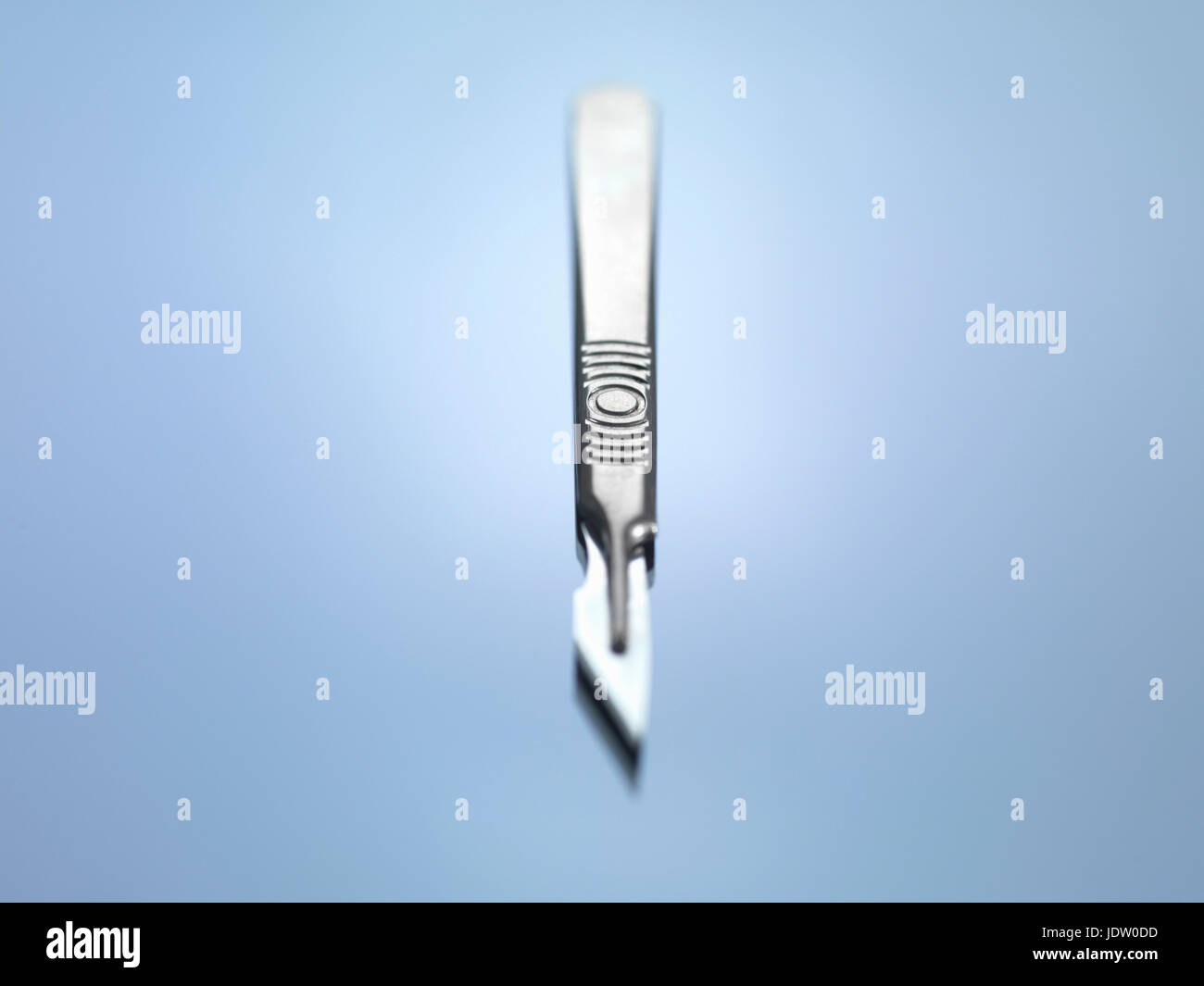 Close up of scalpel on counter Stock Photo