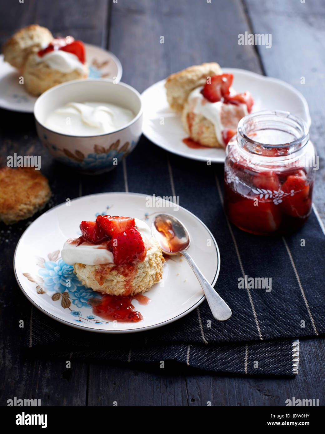 Plate of strawberry shortcake with cream Stock Photo