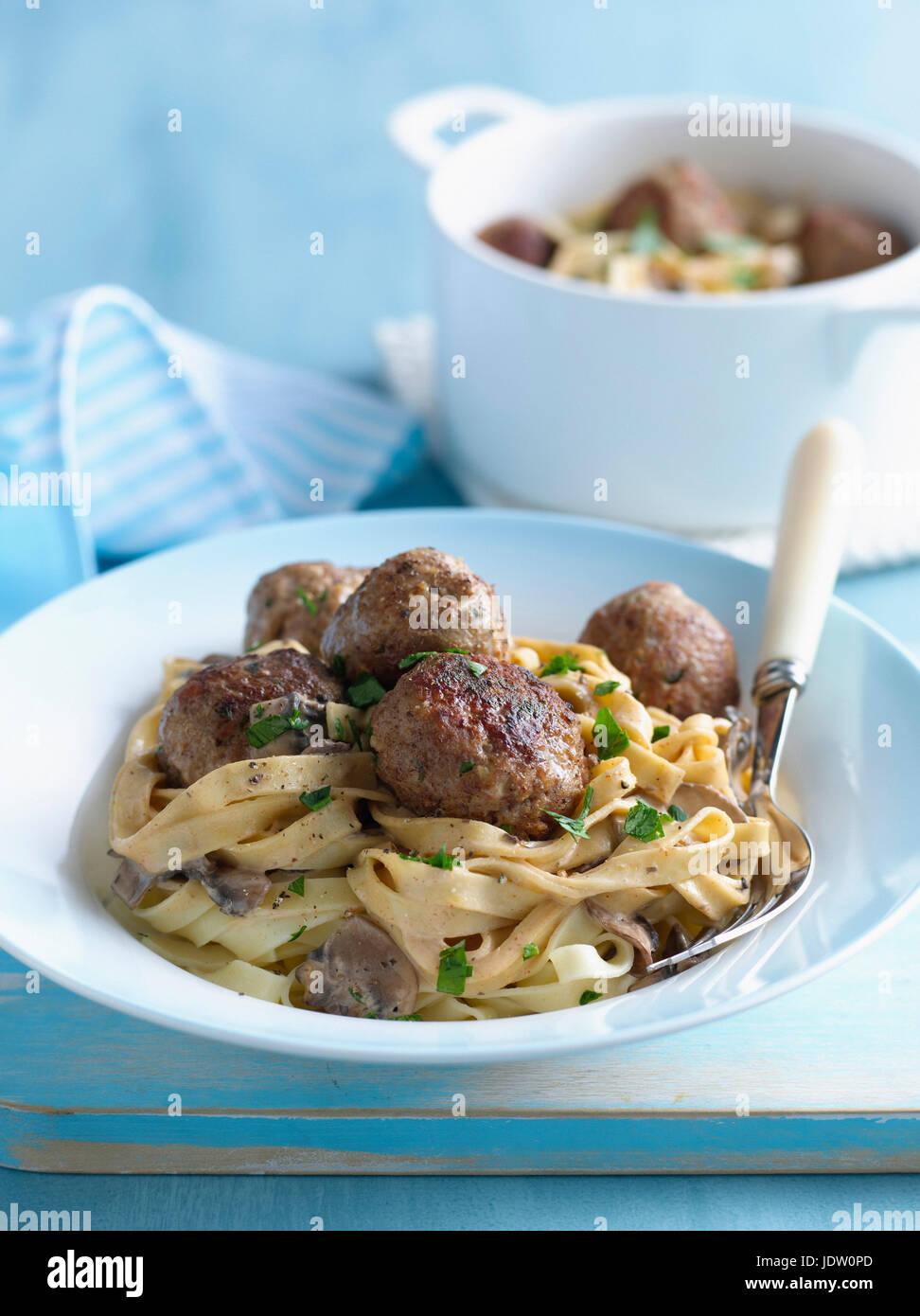 Bowl of pasta with meatballs Stock Photo