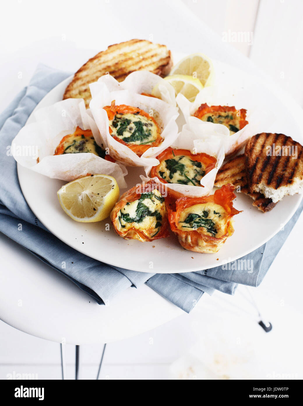 Eggs in salmon cups with toast Stock Photo